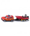 Land Rover Defender avec bateau