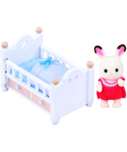 LE BÉBÉ LAPIN CHOCOLAT ET LIT